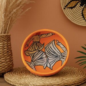 Hand-painted terracotta bowl featuring a whirling dervish design in warm orange and neutral tones