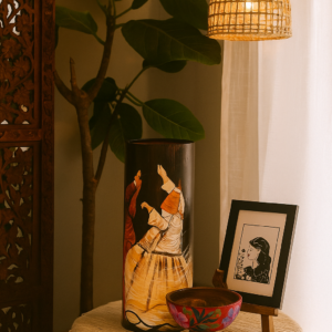 Hand-painted decorative vase featuring a whirling dervish Sufi design in warm earthy tones