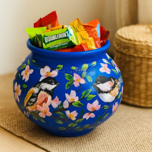 Blue hand-painted terracotta decorative pot with bird artwork and floral pattern
