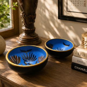 Hand-painted blue terracotta bowl set featuring lotus flower motifs with gold accents