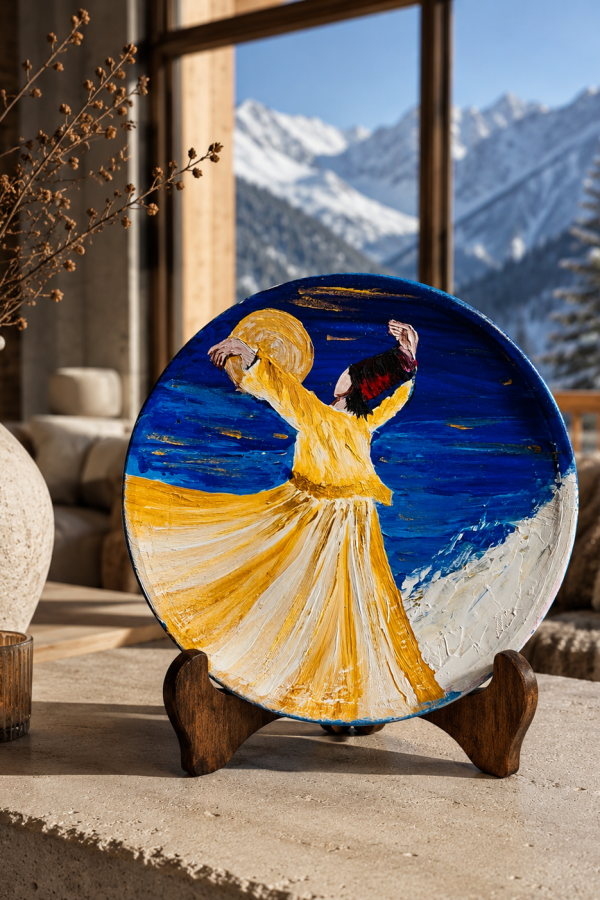 Hand-painted Sufi terracotta decorative plate featuring a whirling dervish against a mountain landscape